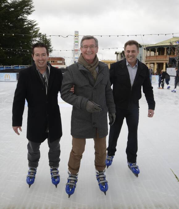 TIME TO SKATE: Member for Bathurst Paul Toole, mayor Gary Rush and McDonald's Bathurst franchise owner Todd Bryant test out the ice rink ahead of the Winter Festival. Photo: PHILL MURRAY 070116pice