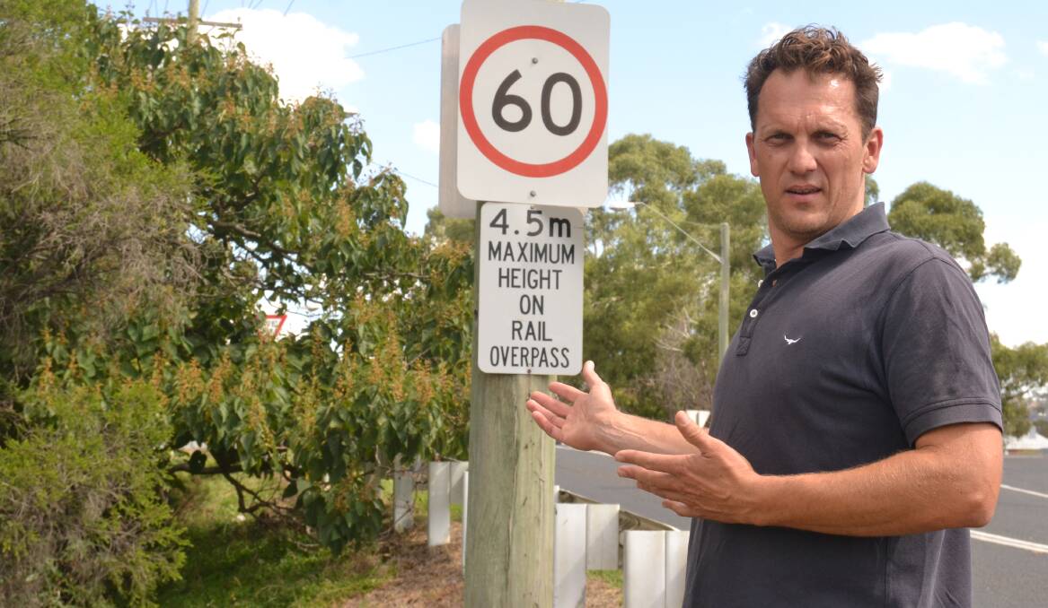 PROBLEMATIC: Councillor Jess Jennings says trees are impacting the visibility at the intersection of Rocket Street and Vale Road, causing people to miss the give way sign. 