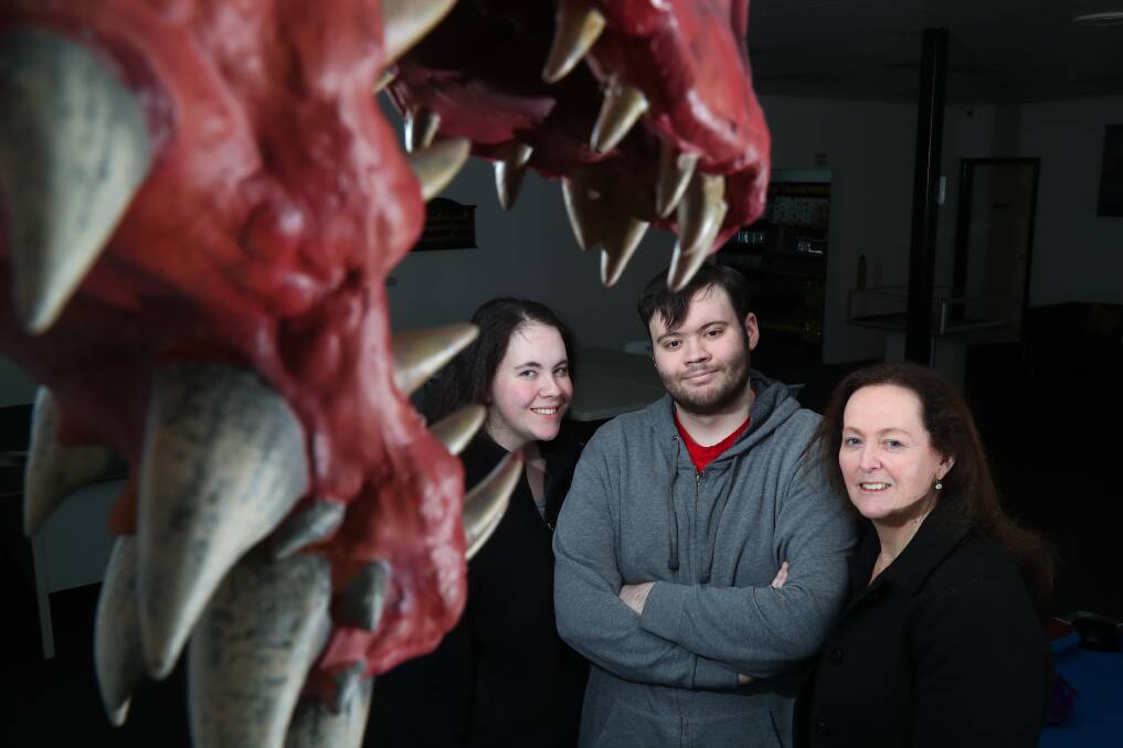JOIN IN: Destiny Williams, Brad Williams and Ann Bantoft are holding a Dungeons and Dragons marathon to raise money. Photo: PHIL BLATCH