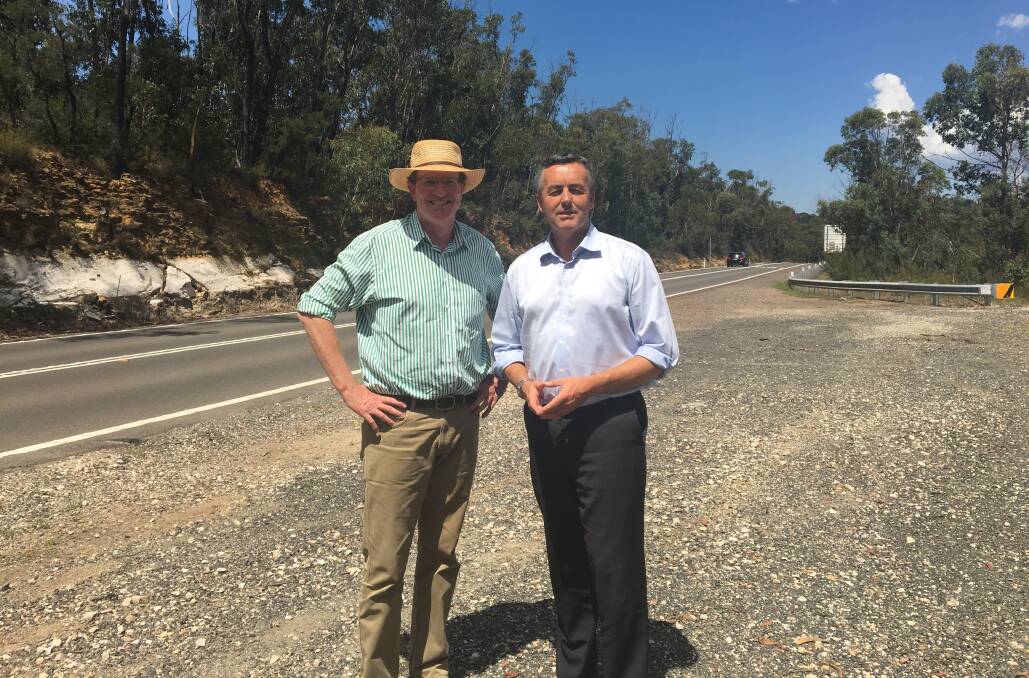MORE TO DO: Member for Calare Andrew Gee and federal Infrastructure Minister Darren Chester on Bells Line of Road. Photo: CONTRIBUTED