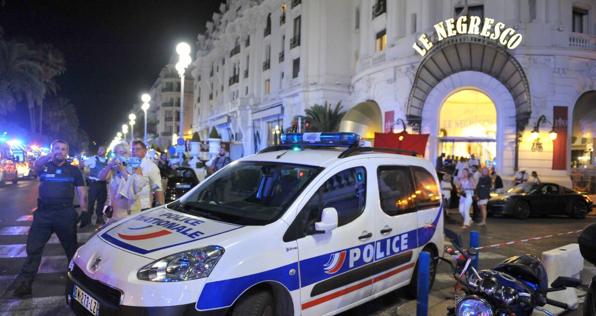 Attack in Nice: A Police car is parked near the scene of an attack. Photo: Christian Alminana