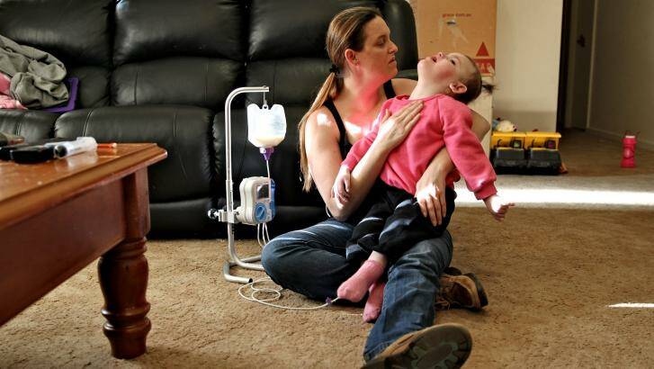 Race against the time: Cherie is desperate for a supply of cannabis oil to help fight her daughter Abbey's disease. Photo: Brendan Esposito