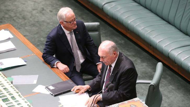 Leaving: Trade Minister Andrew Robb and Deputy Prime Minister Warren Truss at Parliament House on Thursday. Photo: Andrew Meares