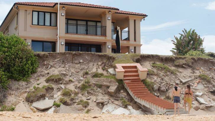 Stairway no longer reaches to heaven: Wamberal beachfront erosion after June's east coast low. Photo: James Brickwood