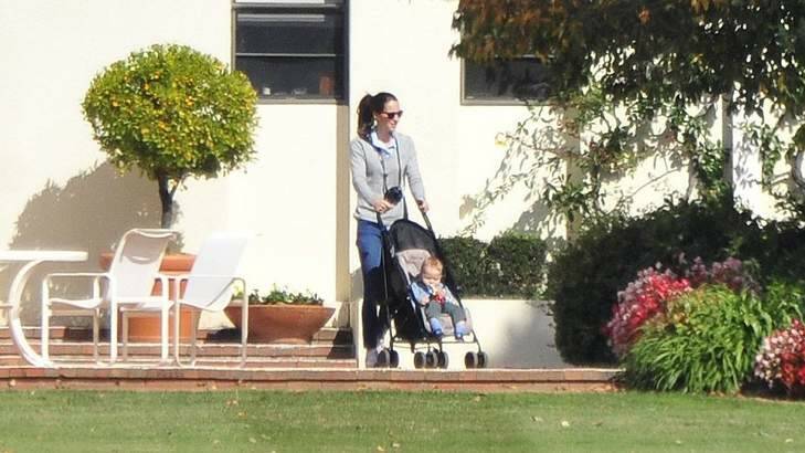 Kate and Prince George enjoy a bit of sun and a stroll at Government House, Yarralumla, Canberra, on Monday. Photo: Jeffrey Chan