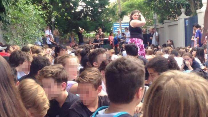 School students at Mosman High School have been evacuated to the laneway behind the school.  Photo: Supplied