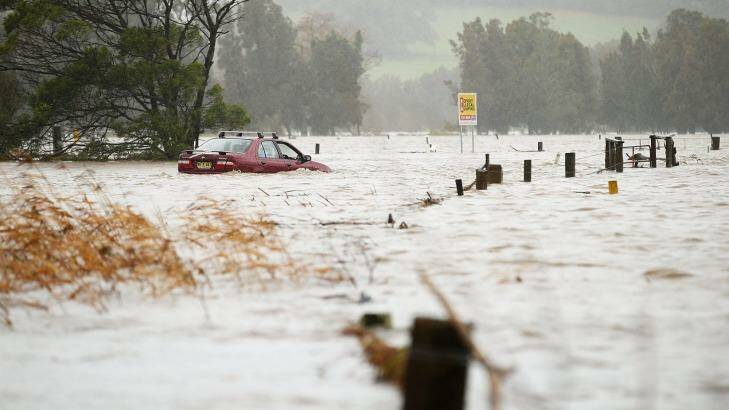 Experts say disasters such as flooding will become more prevalent if climate change continues. Photo: Mark Nolan