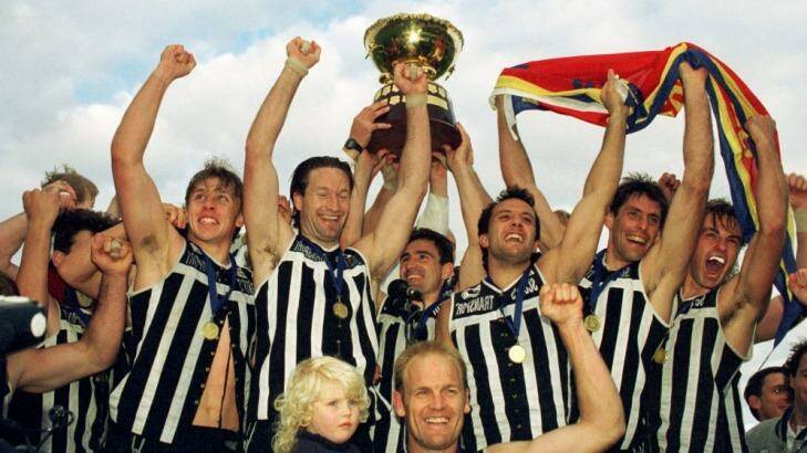 The Port Adelaide Magpies celebrate their 1996 SANFL premiership win Photo: Peter Mathew