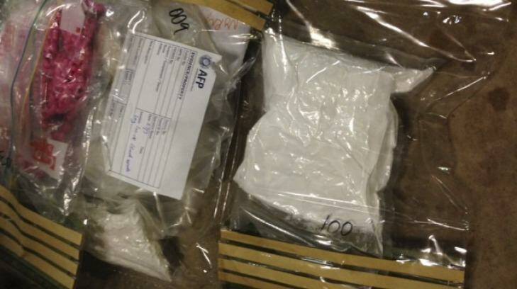 Drugs and cash seized as part of the investigation. Photo: photos@smh.com.au