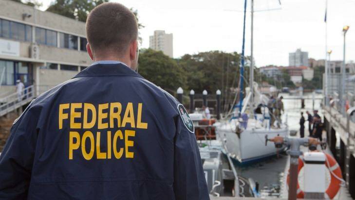 An Australian Federal Police officer watches over the Elakha. Photo: Australian Federal Police.
