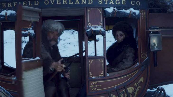 Kurt Russell and Jennifer Jason Leigh on the way to the snowbound cabin.