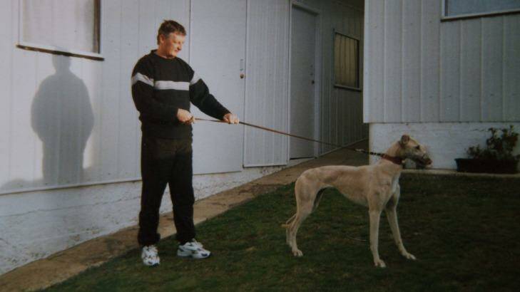 GONE: John Burrows, a local greyhound trainer, with Sandy, one of his greyhounds. Photo: WOLTER PEETERS