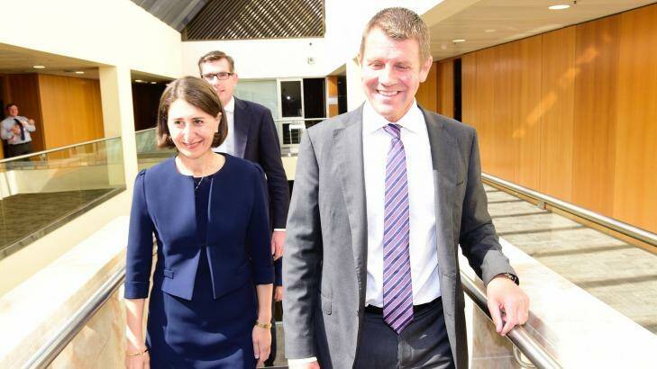 Mike Baird and Gladys Berejiklian arrive for the Liberal Party meeting on Monday. Photo: Wolter Peeters