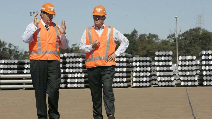 Unions have called for Malcolm Turnbull (right, at the Tomago smelter in 2009) to intervene. Photo: Anita Jones