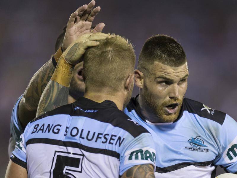 Cronulla's Josh Dugan (R) admits the No.1 jersey is still his favourite to play in at NRL level.