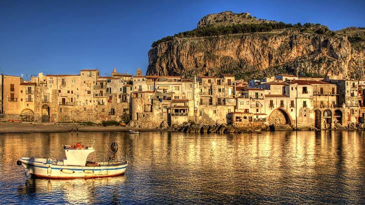 Fishing boat by the pier of Cefalu. Photo: iStock