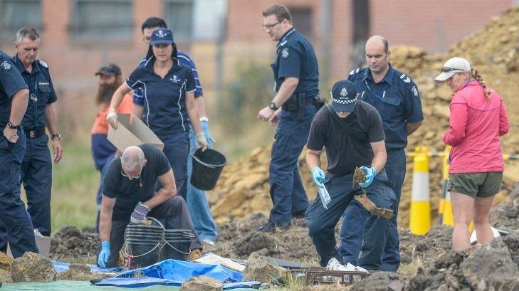 The excavation effort that uncovered the remains police believe are those of armed robber Terry Blewitt. Photo: Justin McManus