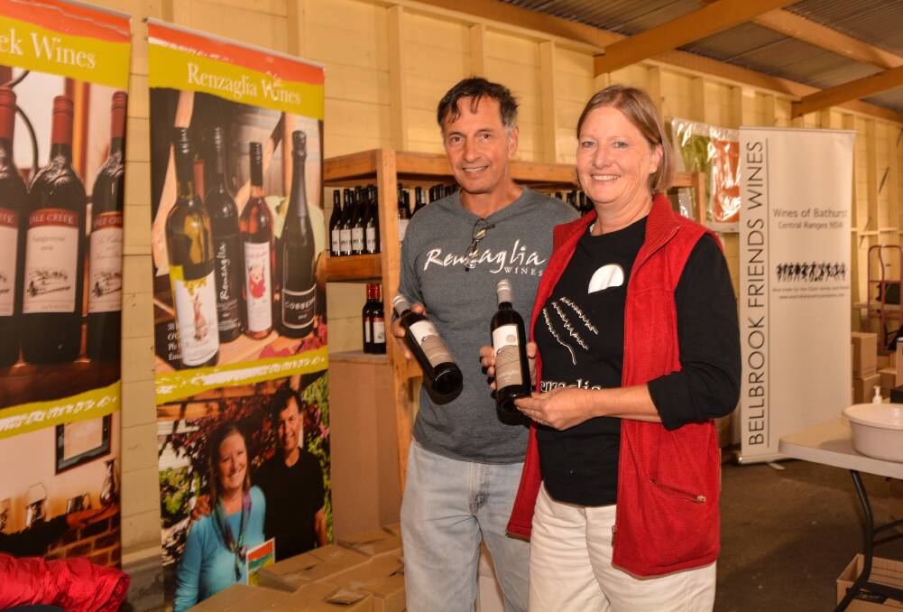 FANCY A DROP: Mark Renzaglia and Sandy Dengate of Renzagia Wines loved being part of this year's Royal Bathurst Show by taking part in the Bathurst Regional Producer's Exhibit. Photo: ZENIO LAPKA 041915zrenzaglia
