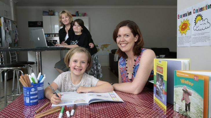 Home school families, rear from left Sue Gerrard from Dunlop with son A.J. Gerrard,10, and front, Suzannah Brough, 6 and mum Kim Brough from Duffy.  Photo: Photo by Jeffrey Chan 