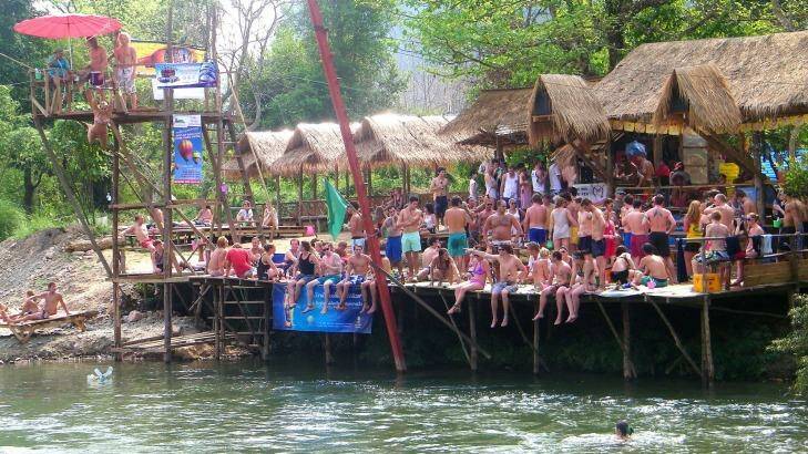 Australian tourists at the now deserted riverside bars in Vang Vieng. Photo: Larissa Ham