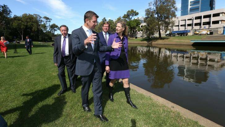 NSW Premier Mike Baird and new director of the Museum of Applied Arts and Sciences Dolla Merrillees opposite the proposed location in Parramatta for the new Powerhouse Museum. Photo: Louise Kennerley