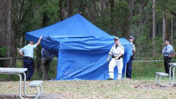Police put up a marquee at Bangalay Reserve in Windale in November 2014, after Renee Mitchell's body was found. Photo: Phil Hearne