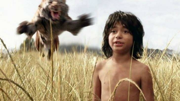 Shere Khan confronts Mowgli (Neel Sethi) in The Jungle Book.