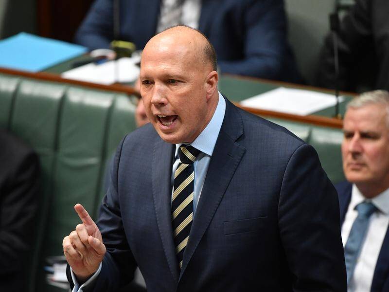 Home Affairs Minister Peter Dutton says the Queensland Teachers Union is stopping schools reopening.