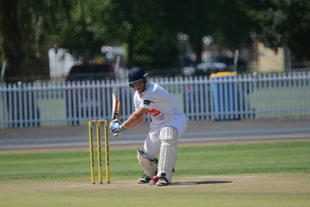 HOPEFUL: Adam Ryan made 36 to top score for his St Pat s Old Boys team on Saturday against Bathurst City, but they will be regretting a major batting collapse that saw them dismissed for just 111. Photo: PHILL MURRAY 	022815padam2