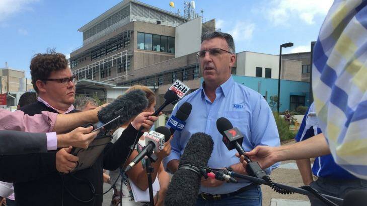 HSU secretary Gerard Hayes, speaking to media outside Nepean Hospital, said security guards were being expected to operate in a "grey zone". Photo: Rachel Olding
