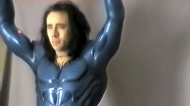 Flight fantastic ... Cage models the costume designed for the ill-fated movie. Photo:  YouTube