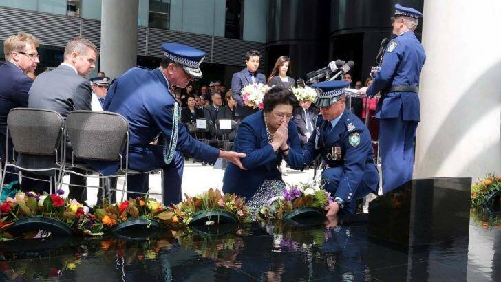 Selina Cheng at the memorial for her late husband Curtis Cheng. Photo: NSW Police