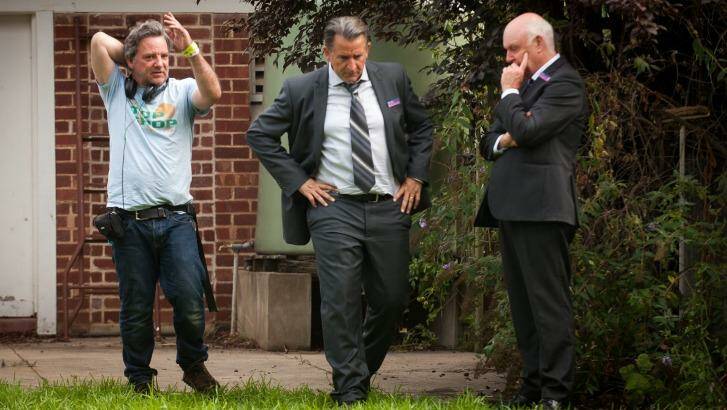 Matthew Saville, left, directs Anthony LaPaglia and John Clarke, right, on the Adelaide set of <i>A Month of Sundays</i>. Photo: Karl Quinn