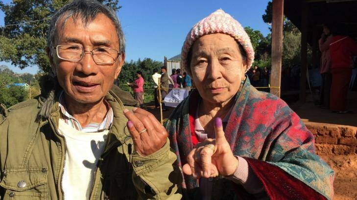 Voters in Kalaw, Myanmar, display their inked fingers after voting in the national election.  Photo: Anne Davies