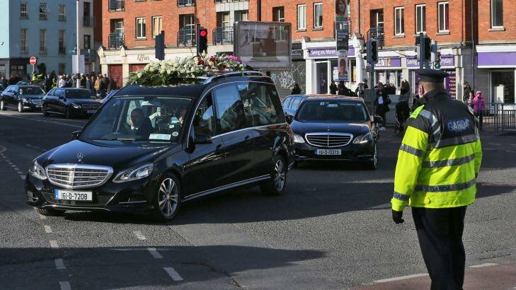 David Byrne's funeral cortege on the way through the streets of Dublin on Monday. Photo: Niall Carson