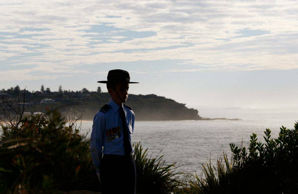  A Catafalque Party Mount member stands guard during the Anzac Service at Freshwater. Photo: Daniel Munoz