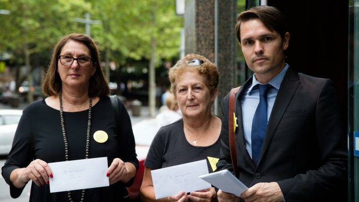 Anti-CSG protestors present letters to the Sydney office of Santos' new chief executive, Kevin Gallagher. Photo: Edwina Pickles