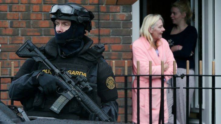 Armed police from the force's Emergency Response Unit on patrol, as gang violence resulted in two murders in four days in Dublin. Photo: Niall Carson