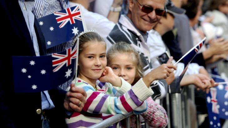 People watch the Anzac Day march along George Street, Sydney in 2009.  Photo: Tamara Dean