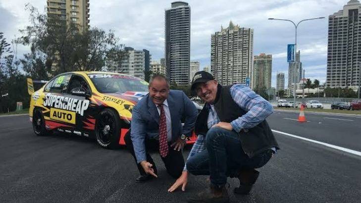 The new "super-bitumen" mix for the Gold Coast V8 Supercar track is inspected by Gold Coast mayor Tom Tate and driver Paul Morris. Photo: supplied