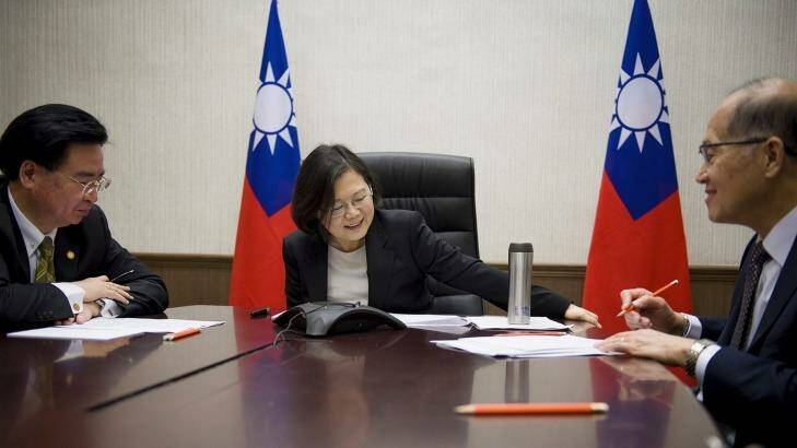 Tsai Ing-wen, flanked by National Security Council Secretary-General Joseph Wu, left, and Foreign Minister David Lee, speaks with Donald Trump on Friday. Photo: Taiwan Presidential Office via AP