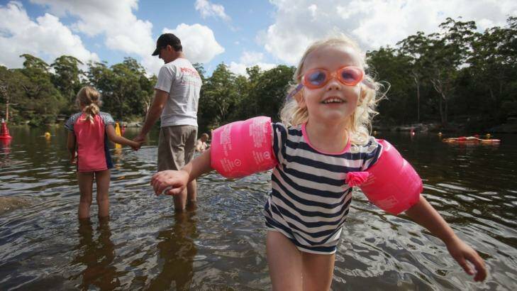 Get there early: Daisy, 3, enjoys a swim at Lake Parramatta. Photo: Fiona Morris