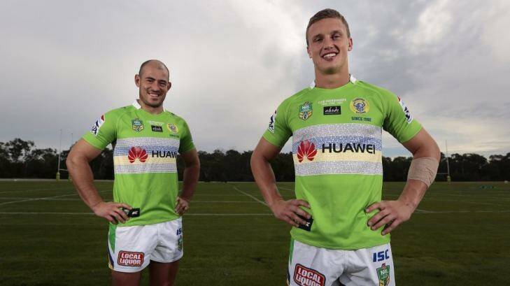 Raiders halves Terry Campese and Jack Wighton show off Canberra's special heritage jersey, whcih they will wear against Penrith. Photo: Jeffrey Chan