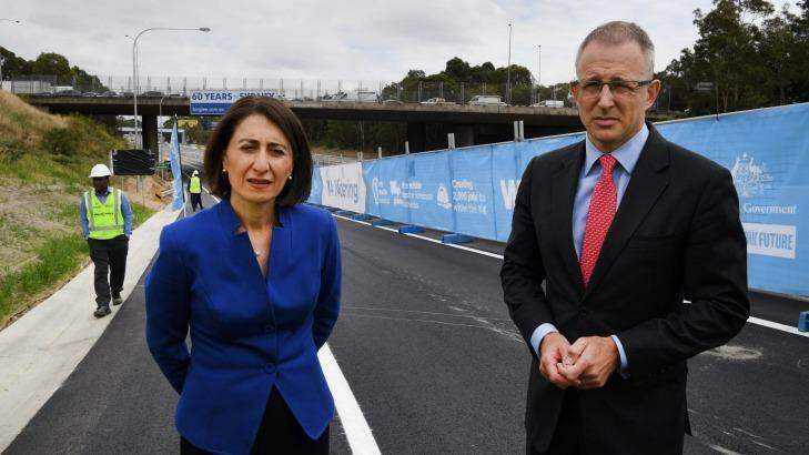 Premier Gladys Berejiklian and federal Urban Infrastructure Minister Paul Fletcher at the opening of a part of WestConnex last month. Photo: Louise Kennerley