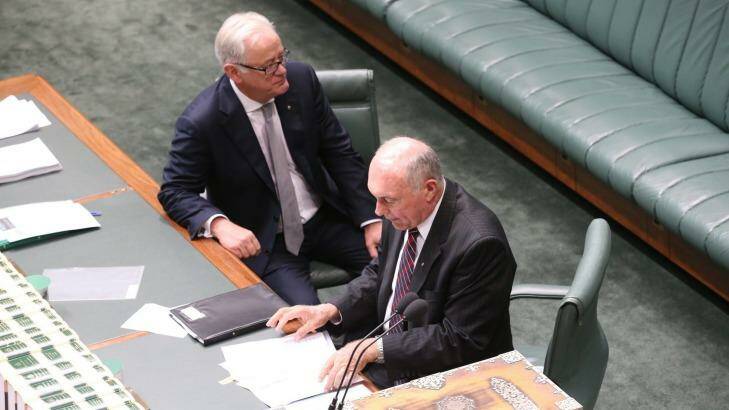 Leaving: Trade Minister Andrew Robb and Deputy Prime Minister Warren Truss at Parliament House on Thursday. Photo: Andrew Meares