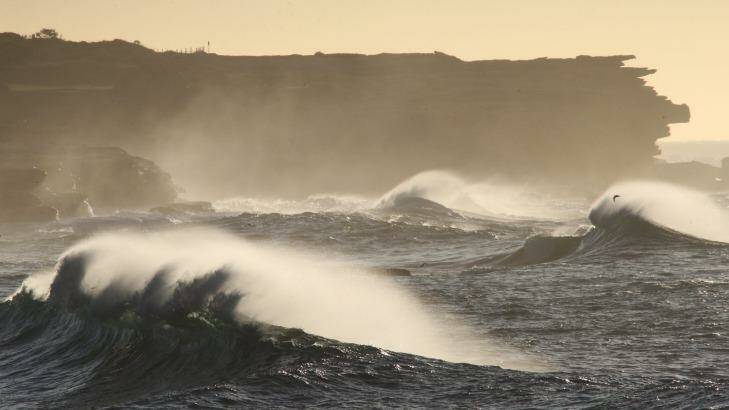 Large waves pound Clovelly early on Wednesday morning. Photo: Peter Rae
