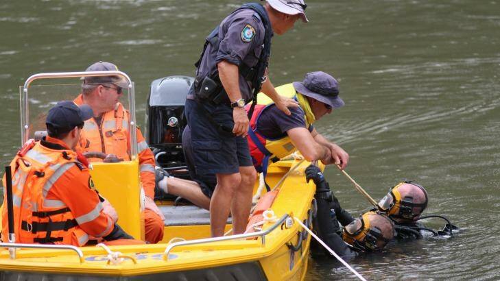 Police divers search the Murrumbidgee River in Wagga on Thursday, after Peter Abd-El-Kaddous went missing. Photo: The Daily Advertiser