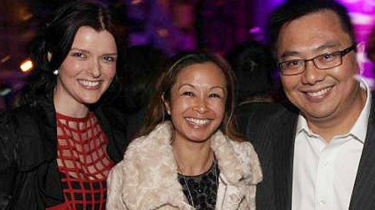 Amber Harrison, left, with former boss Nick Chan and his wife Peggy. Photo: Supplied