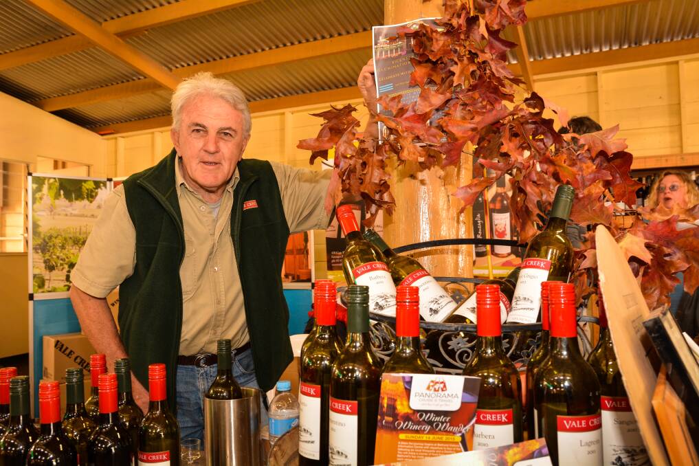 LOCAL FOOD AND WINE: Tony Hatch, President of Wines of Bathurst, enjoyed being one of the wine producers taking part in the Royal Bathurst Show this year. Photo: ZENIO LAPKA 041915zhatch