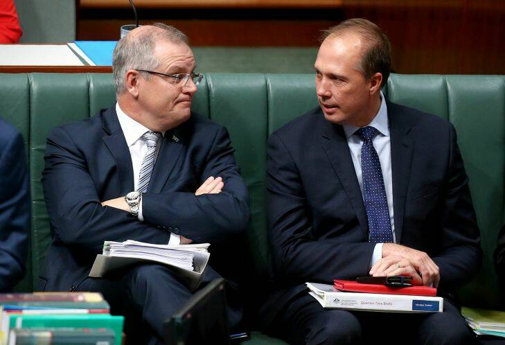 Treasurer Scott Morrison and Minister for Immigration and Border Protection Peter Dutton during Question Time at Parliament House in Canberra on Monday 2 May 2016. Photo: Alex Ellinghausen